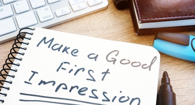 Make A Good First Impression handwritten in a notepad.