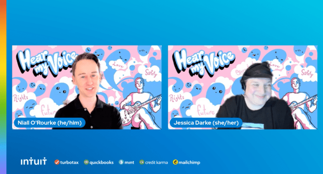 A screen grab of two professionals with pink and blue artwork behind them.