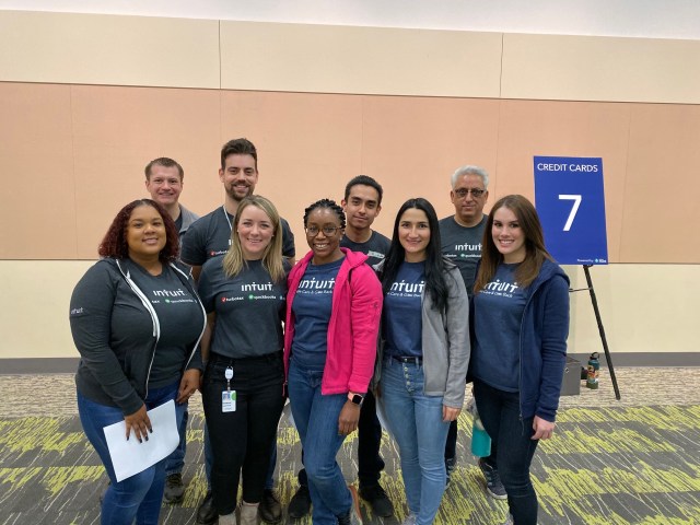 Intuit employees pose at a financial literacy even in Nevada.