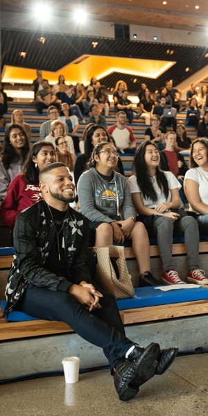 Intuit employees smiling at company event