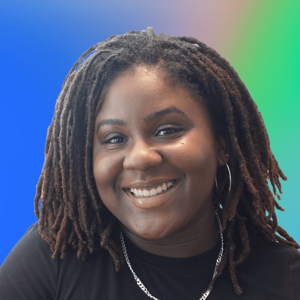 Ebony Hargro headshot with blue green gradient background