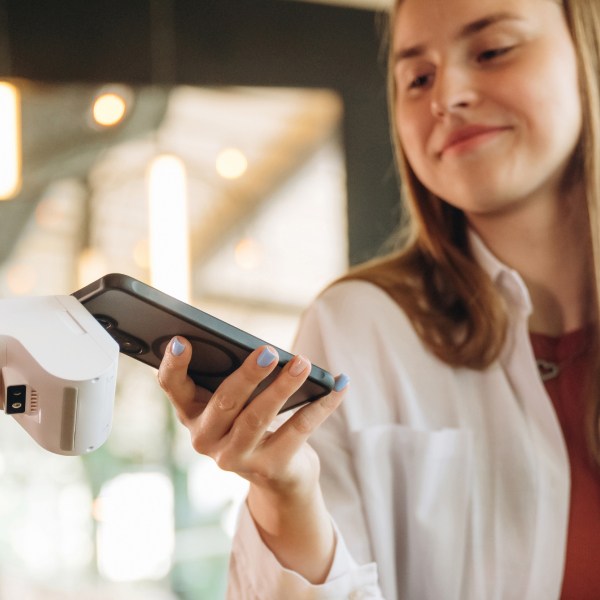 Girl using digital wallet to pay
