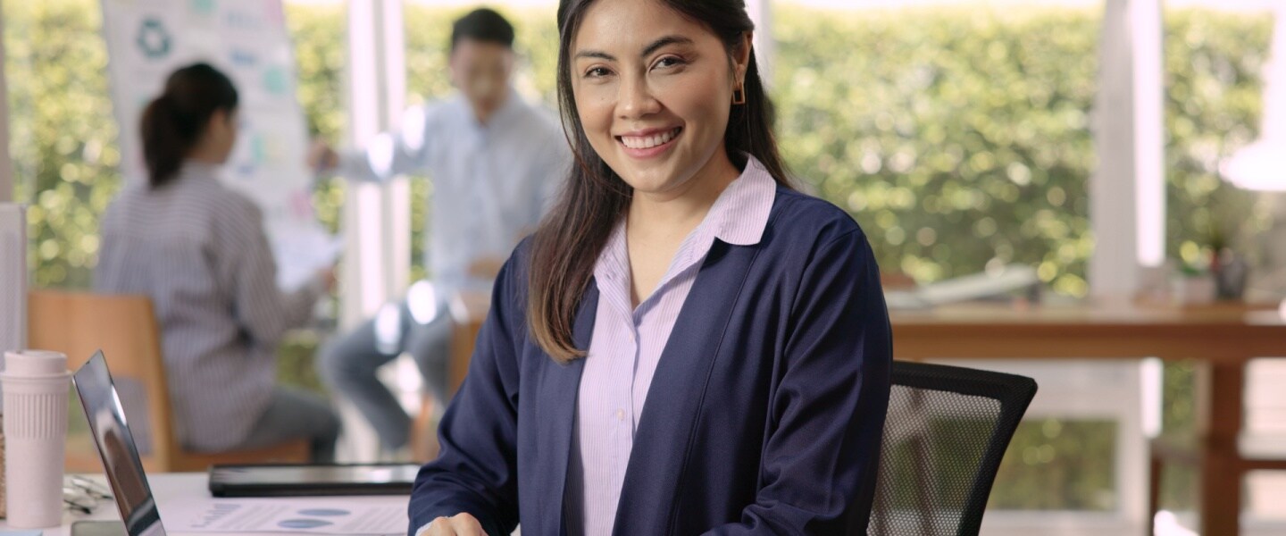 Professional woman sitting at desk