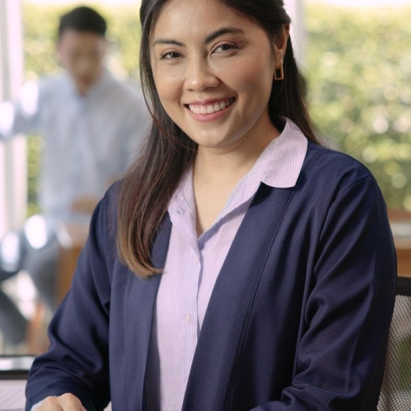 Professional woman sitting at desk