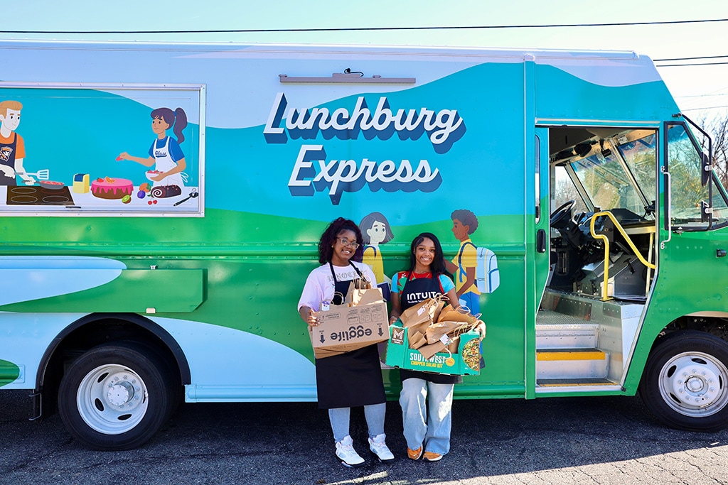 Students posing in front of the food turkc, Lunchburg Express