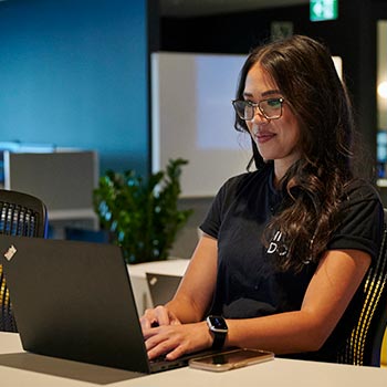 toronto-employee-smiling-laptop-photo-icom-20220831-350x350.jpg Image Alt Text