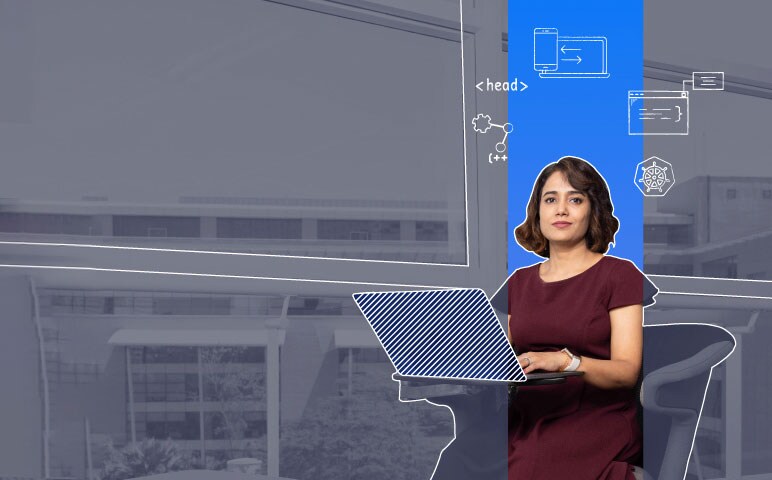 A person standing in front of a laptop computer.