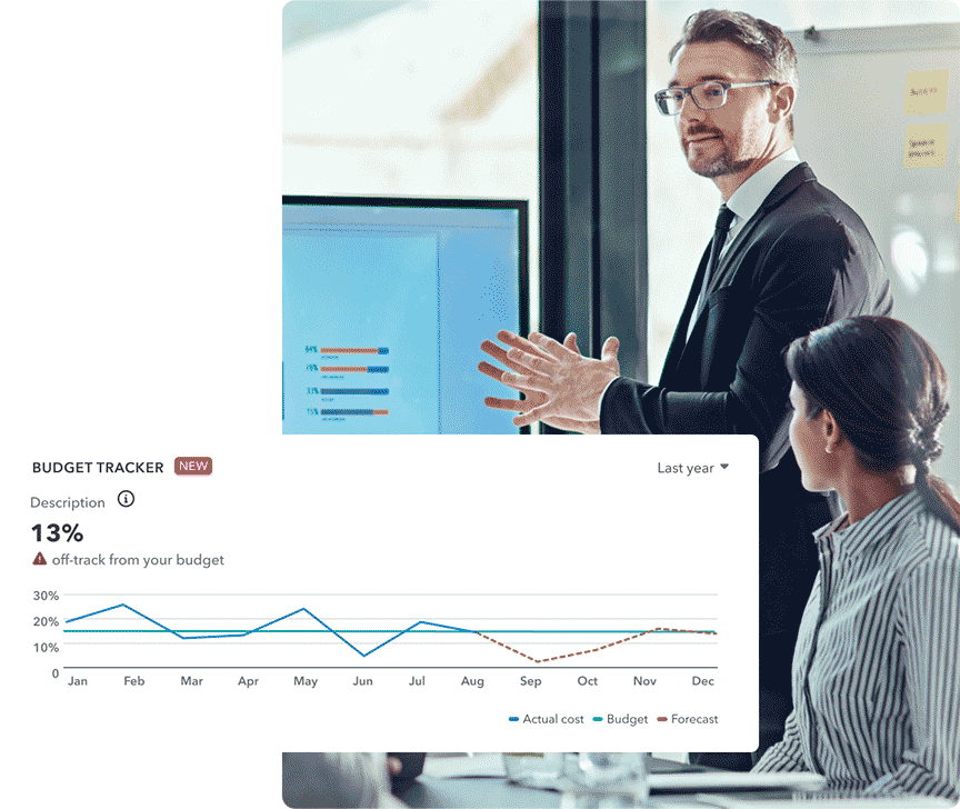 A black and white photo of a person in a suit.