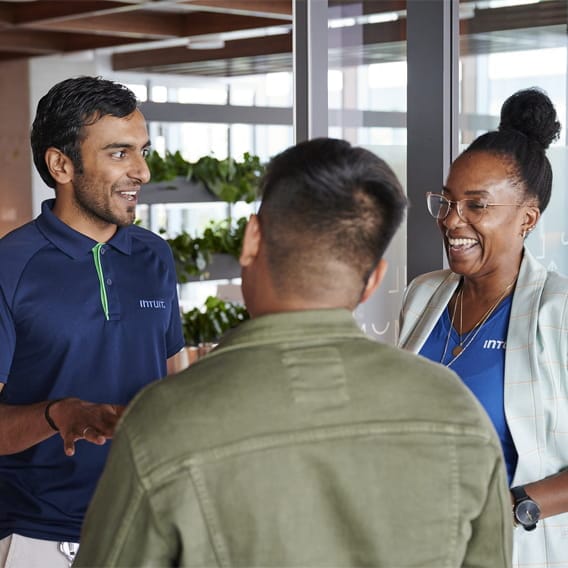 Colleagues chatting in the breakroom