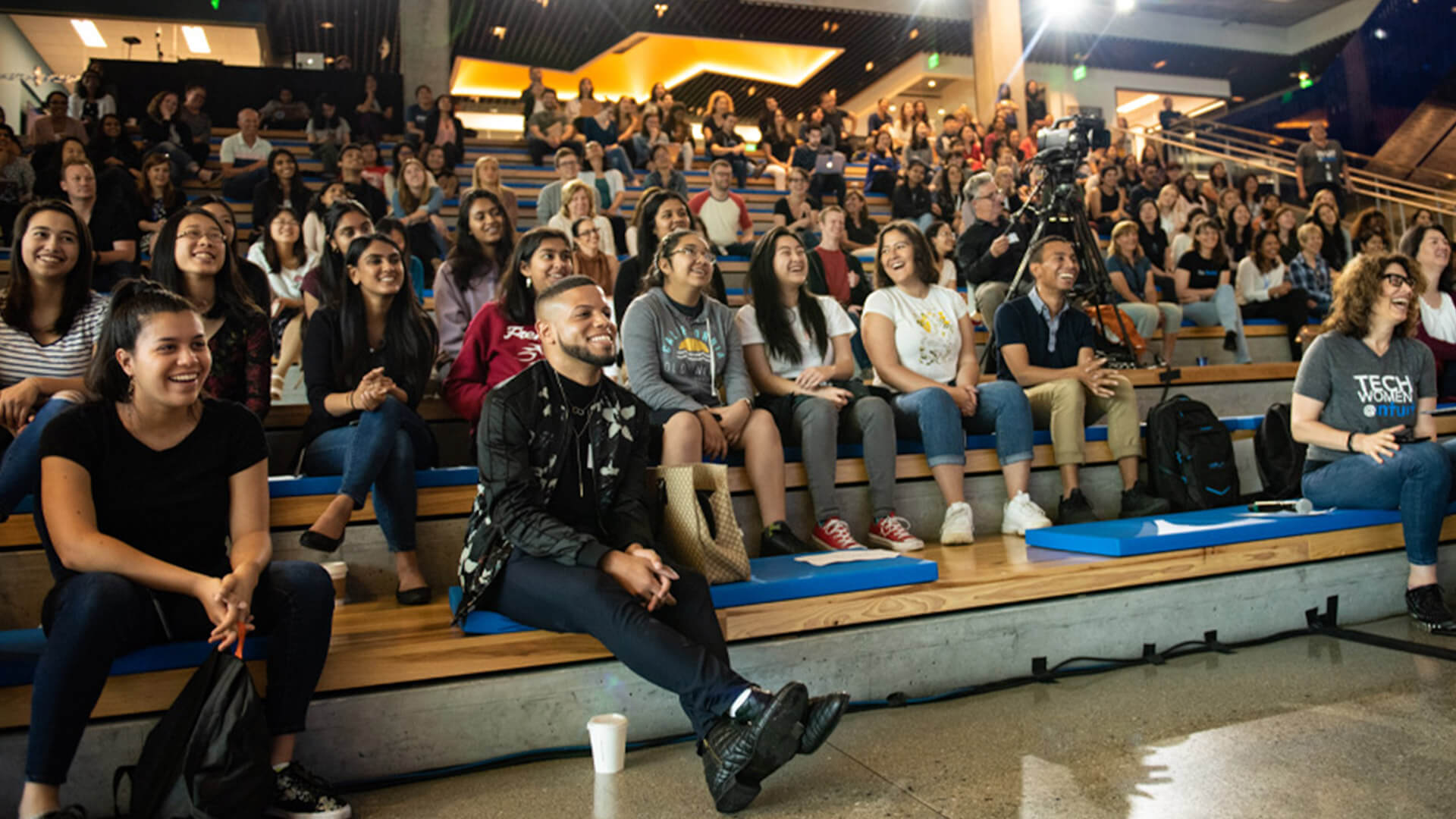Intuit employees enjoying a company all-hands Intuit employees enjoying a company all-hands