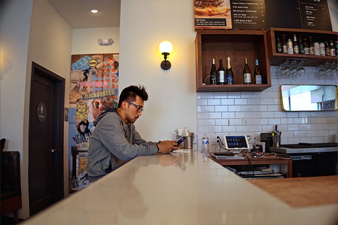 Man sitting at the bar in a restuarant
