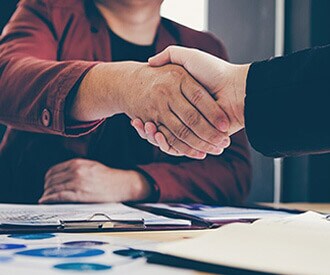 two people shaking hands