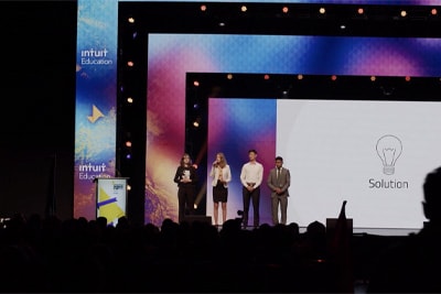 Students on stage at Enactus World Cup 2019