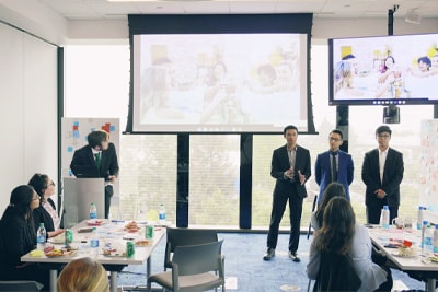 Male students doing a presentation