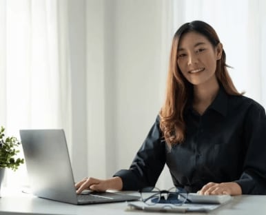 A painting of a person sitting at a table with a cup.