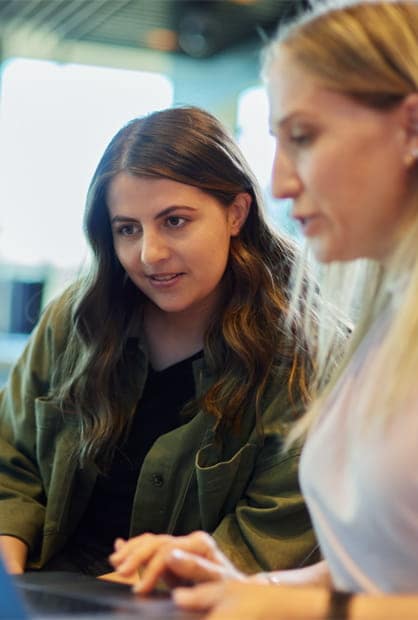 female-engineers-using-laptop-photo-icom-desktop-418x620.jpeg Image Alt Text