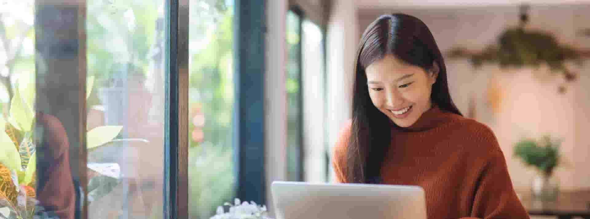 Female student using a laptop