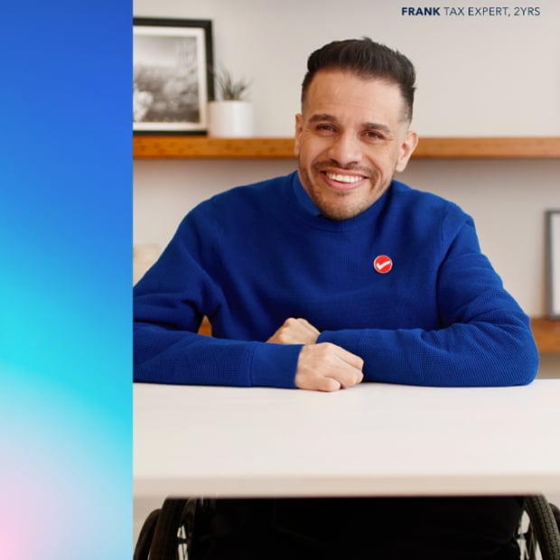 A person sitting with his arms on the table.