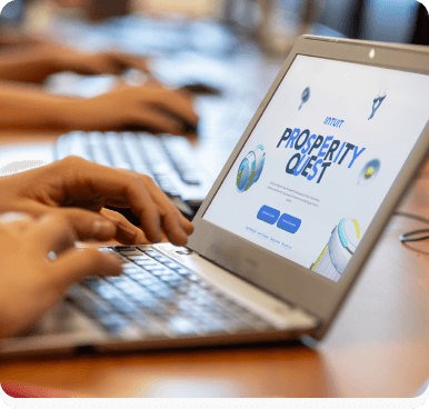 A pile of cellphones sitting on top of a table.