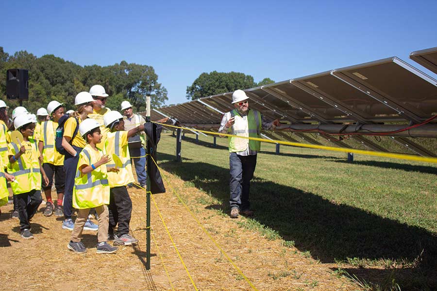Clearloop Students viewing solar panels