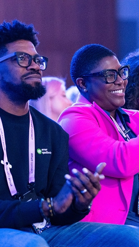 Attendees clapping at Intuit Connect 2025