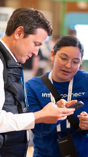 Intuit founder Scott Cook posing with an attendee