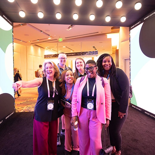 Attendees posing for a photo at Intuit Connect