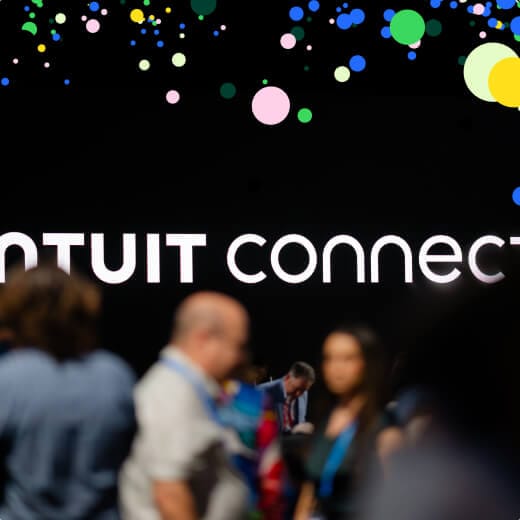 A crowd of people standing around a bunch of electronic devices.