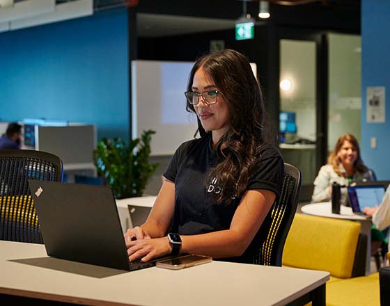 Intuit employee on laptop