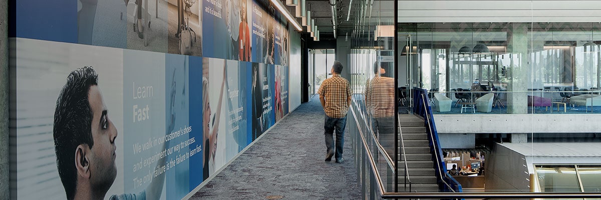 Intuit employee walking in the halls of building 20 campus 