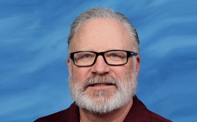 pat-hambright-headshot-photo-icom-desktop-386x240.jpg Headshot photo of Pat Hambright