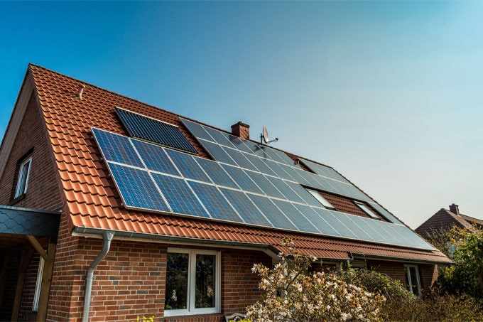 Solar panels on a red roof