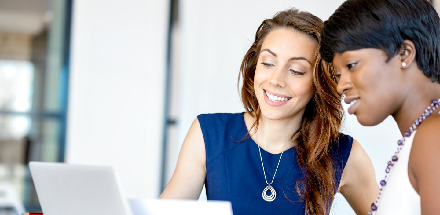 Women working together in an office