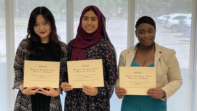 Team LJ holding their Intuit certificates