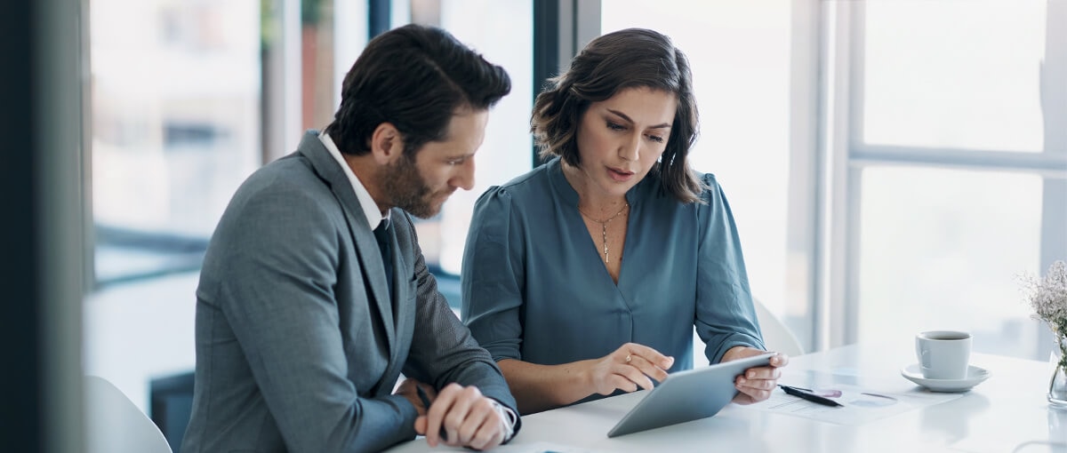 A person and person sitting next to each other.