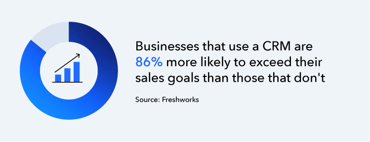 A person holding a cup with a picture of a person on it.