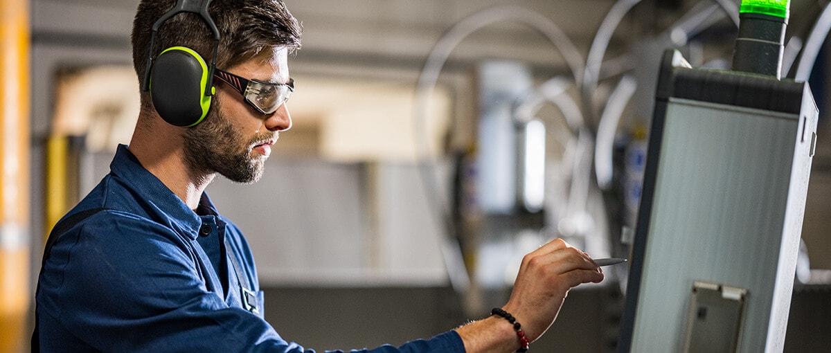 An engineer using construction automation software.